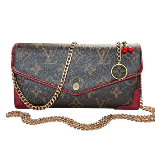 LOUIS VUITTON Red Monogram Retro Sarah Wallet with added Chain/Charm Louis Vuitton