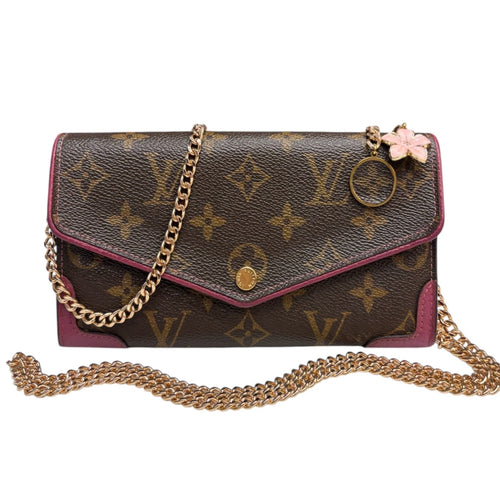 LOUIS VUITTON Magenta Monogram Retro Sarah Wallet with added Chain/Charm Louis Vuitton