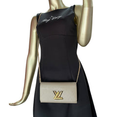 LOUIS VUITTON Taupe Epi Leather Twist Wallet Louis Vuitton