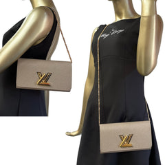 LOUIS VUITTON Taupe Epi Leather Twist Wallet Louis Vuitton