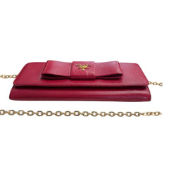 PRADA Magenta Saffiano Leather Bow Wallet with added Chain Prada