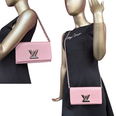 LOUIS VUITTON Pink Epi Leather Twist Wallet Louis Vuitton