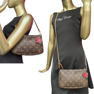 LOUIS VUITTON Monogram Coated Canvas Pochette Accessoires Louis Vuitton