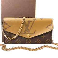LOUIS VUITTON Reverse Monogram Sarah Wallet with added Chain Louis Vuitton