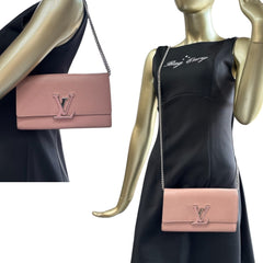 LOUIS VUITTON Pink Taurillon Capucines Leather Wallet with Chain Louis Vuitton