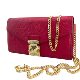 LOUIS VUITTON Hot Pink Empreinte Leather Metis Wallet with added Gold Chain Louis Vuitton