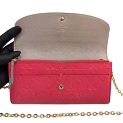LOUIS VUITTON Pink Monogram Empreinte Emilie Wallet with added Chain