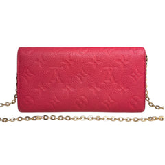 LOUIS VUITTON Pink Monogram Empreinte Emilie Wallet with added Chain