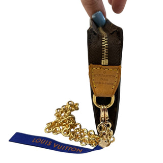 LOUIS VUITTON Monogram Coated Canvas Poche 17 with Wrist Chain Louis Vuitton